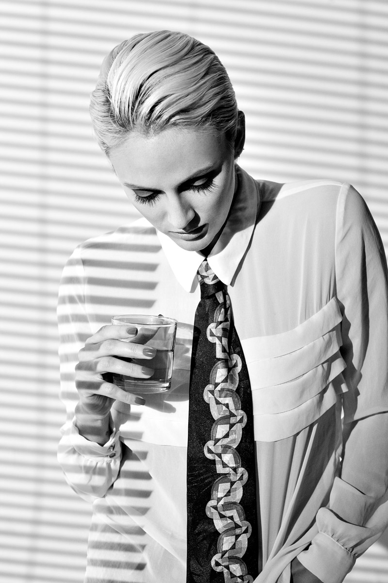 White paneled chiffon blouse, men's black geometric patterned tie