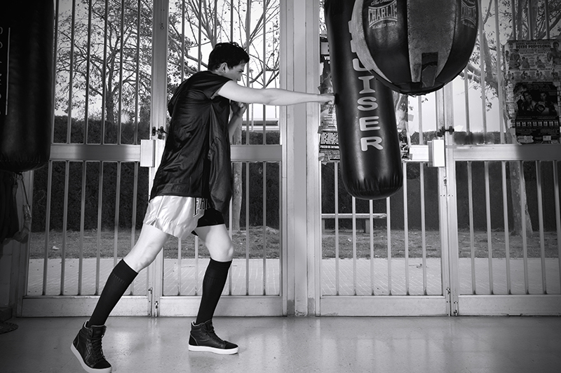 Jacket: Givenchy, shorts: Everlast, socks: Adidas, sneakers: G-Star