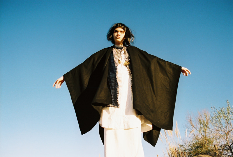 Cape: Saralegui, Shirt&Skirt: Bastardo ba, Vest: NASIF, Necklace: Cruda.