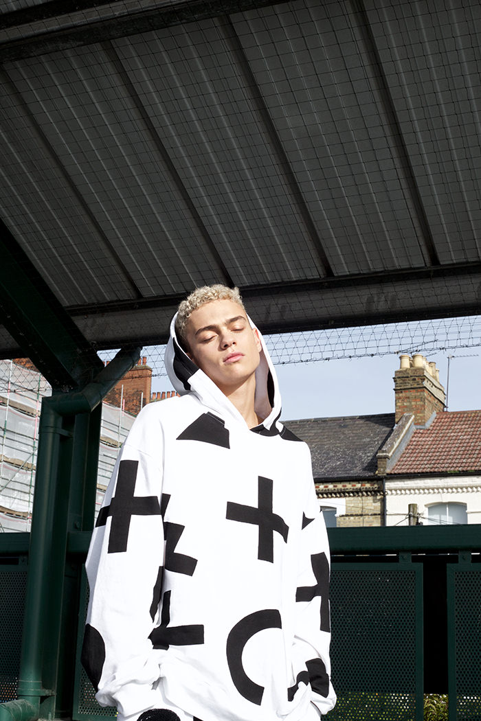 Joel wears: Tracksuit by Vinti Andrews