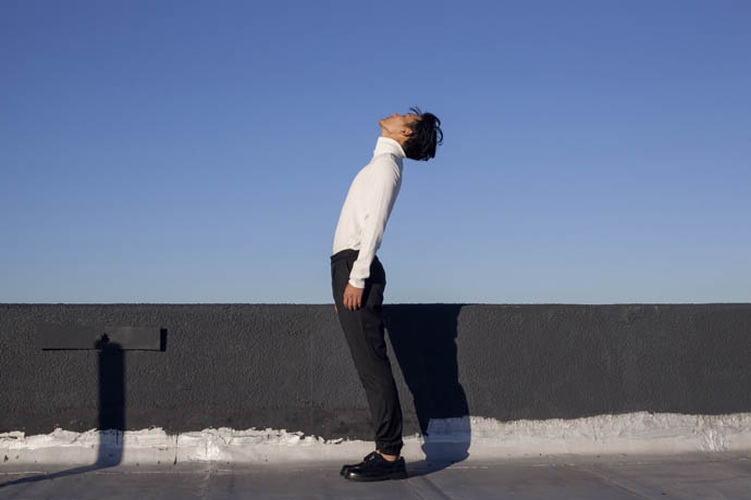 Trousers by Chalayan - High neck jumper by Acne Studios - Shoes by Givenchy 