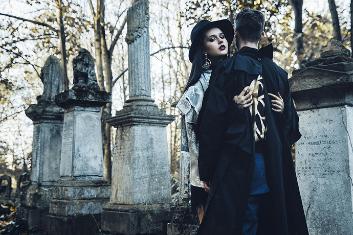 Freyja wearing Top& Dress: Alexandru Tunsu Hat: Maison Michel Earrings: National Theatre Owen wearing Jacket: Hiroshi Goto Coat& Trousers: Louisa Pang