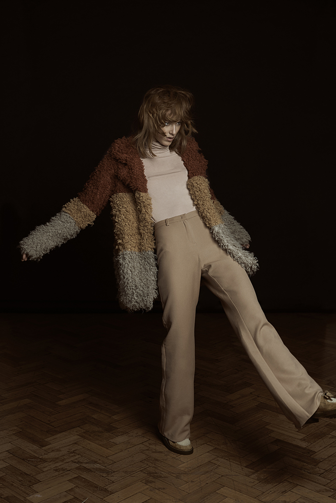 Pink turtleneck – HALLHUBER Caramel trousers – HALLHUBER Red/Tan/Grey shaggy coat – Minkpink Caramel suede shoes - Paul and Joe 