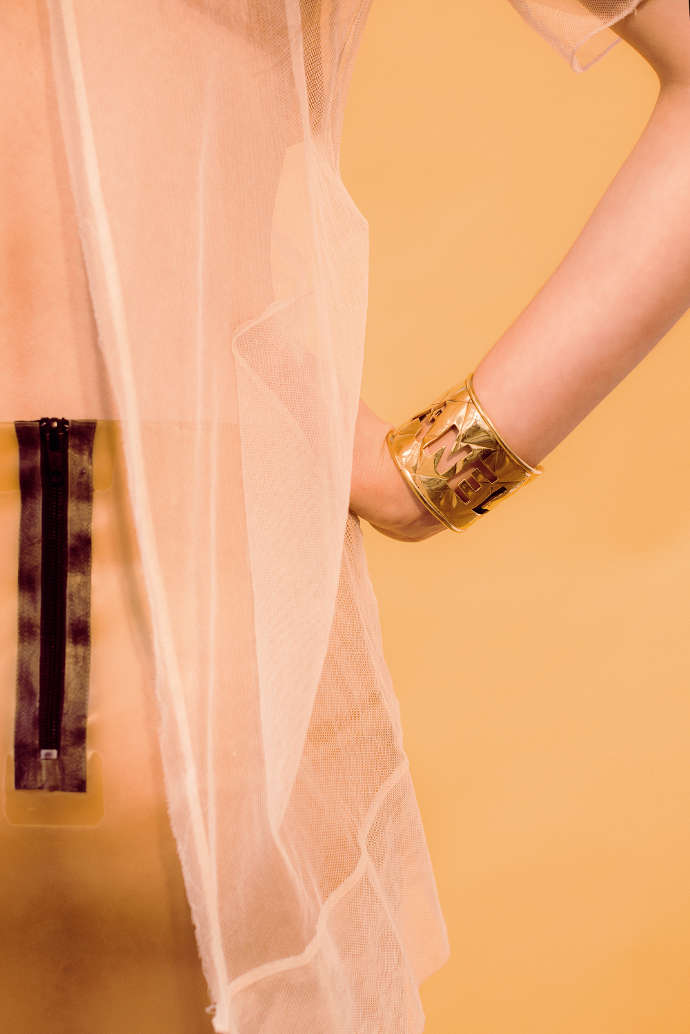 Coat – Comme des Garcons, Blouse – Avin, Bracelett – Chanel, Latexrskirt, Bra - No Name, Necklace – No name