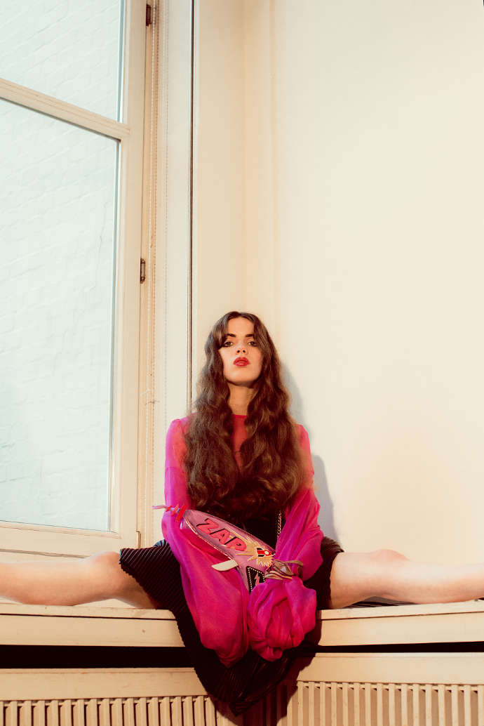 Bag – Skinny Dip London, Skirt – JW Anderson, Blouse - Sportstaff 