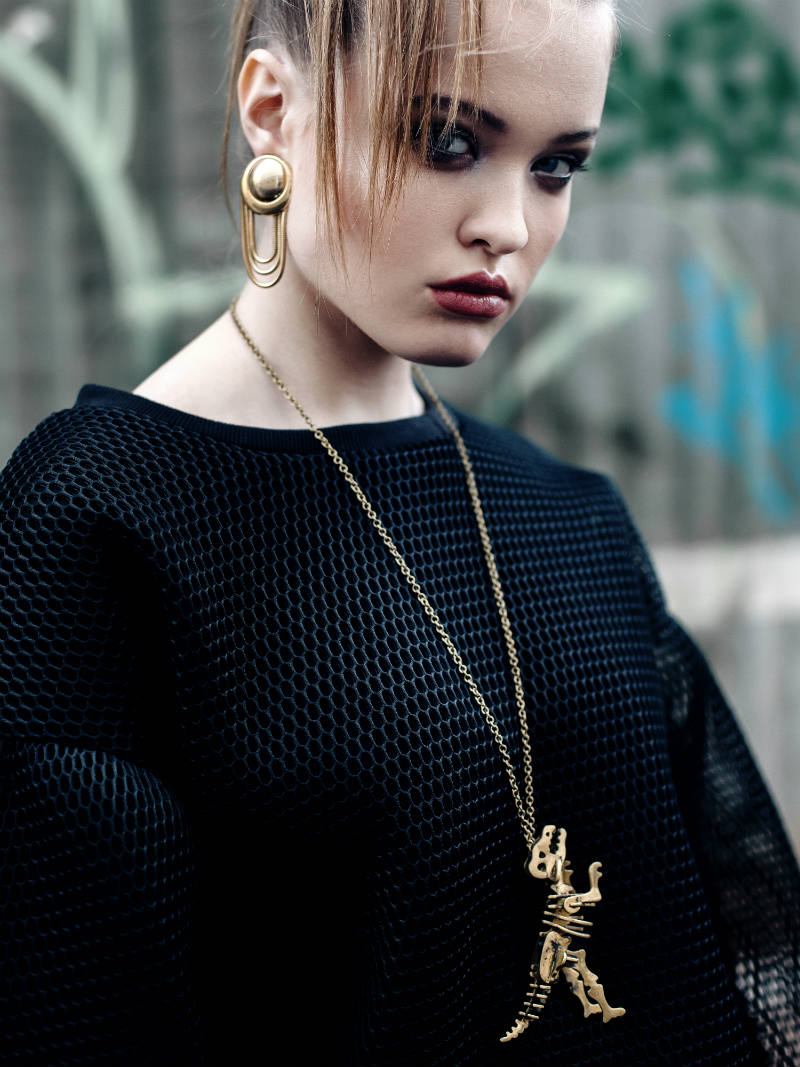 Sweater: J.W. Anderson Vintage clips: Velvet Amulet Necklace with Dinosaur: Yalo Yard