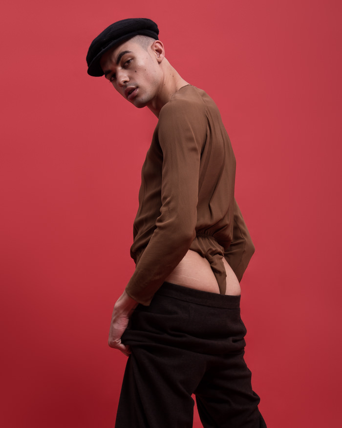 Malik wears Bodysuit Michael Kors, Trousers Michael Kors, Hat Stylist’s Own