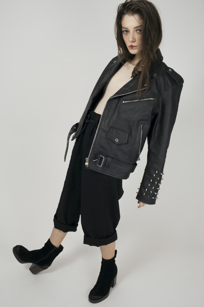 Bogdana is wearing jacket by All Saints, body by Wolford, pants by Acne Studios and shoes by Musette