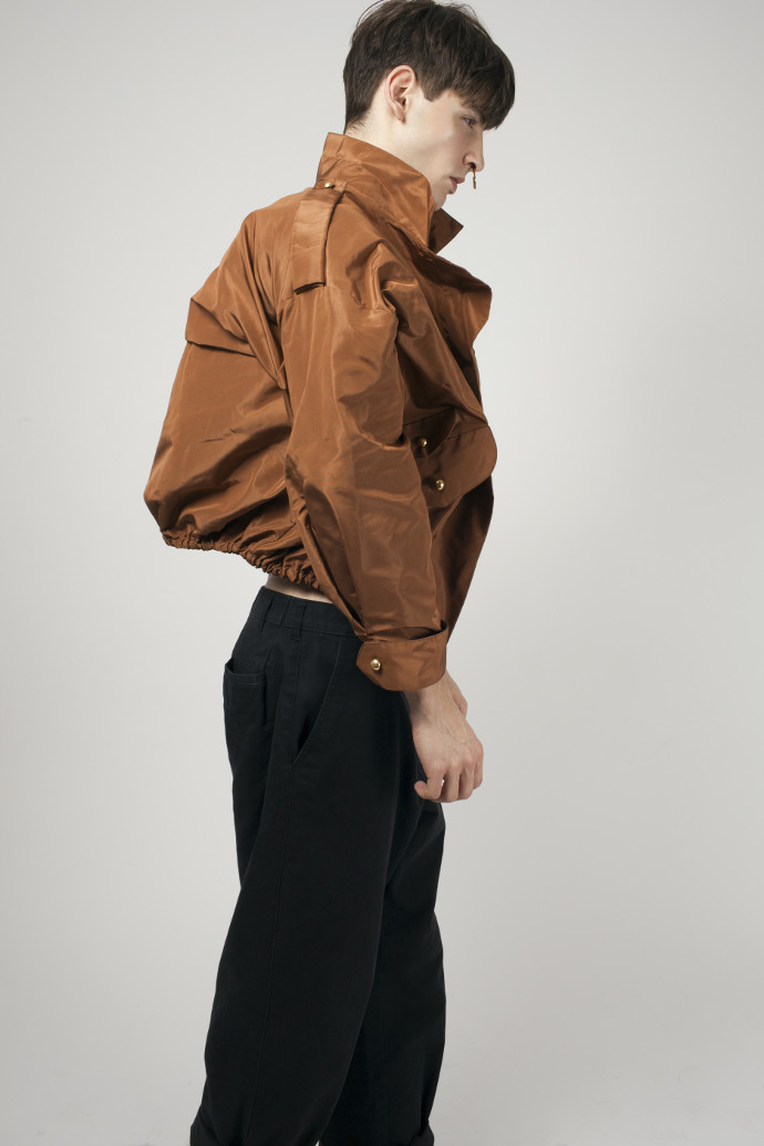 Gabriel is wearing jacket by Atu Body Couture, pants Aiezen and earring by Renard