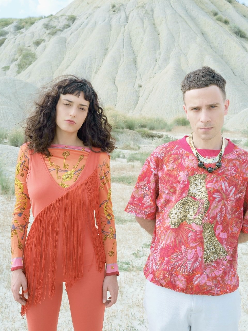 Cyen wears: top Hermès Vintage, jumpsuit Asos, shoes Nike. Alfredo wears: Cyen’s jewels, t-shirt Salvatore Ferragamo Vintage, trousers stylist’s own, shoes Champion.