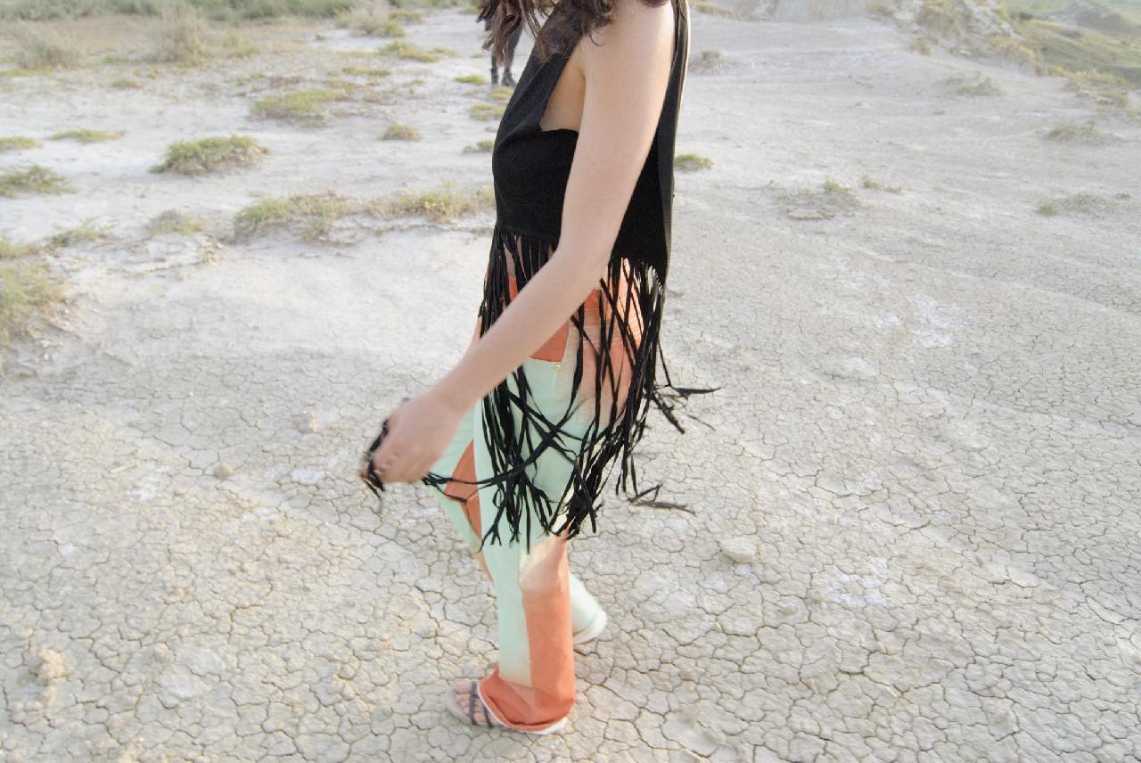 Cyen’s wears jeans Roberto Cavalli Vintage, vest worn as a top and shoes model’s own.