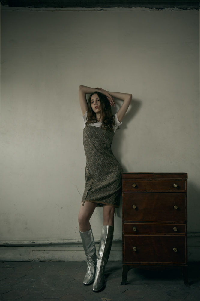 White tee by Theory Knit dress by Maria Aristidou Silver boots by Carel Paris 
