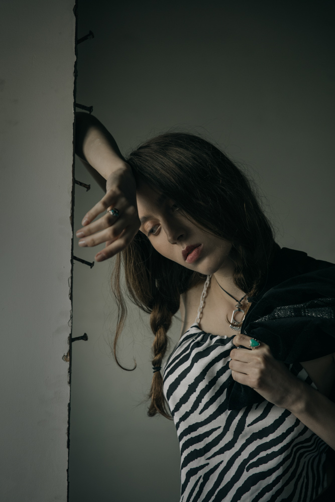 Zebra motif top by Bowsdontcry Velvet jacket by Maria Aristidou Necklace, rings by Harpo