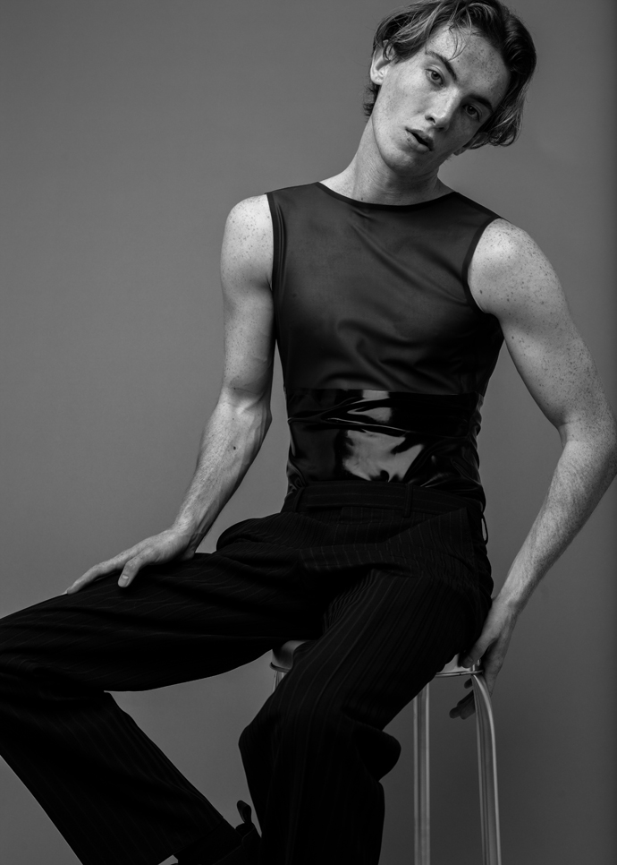 Theo: Latex bodysuit Kim West Pinstripe Pants Hugo Boss