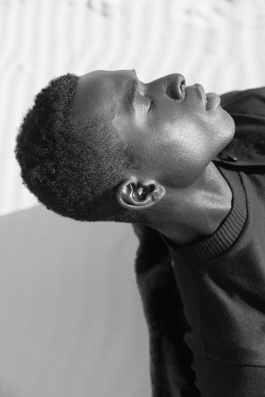 Jersey by Lukhanyo Mdingi, trench coat by Zara