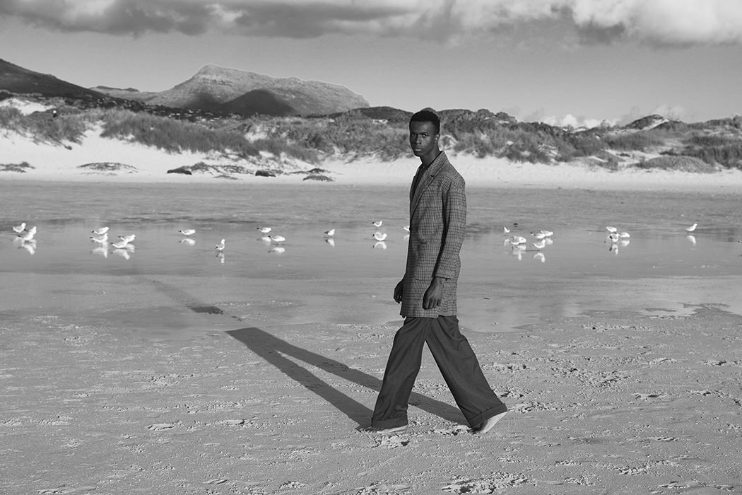 Coat by Topman, trousers by Lukhanyo Mdingi