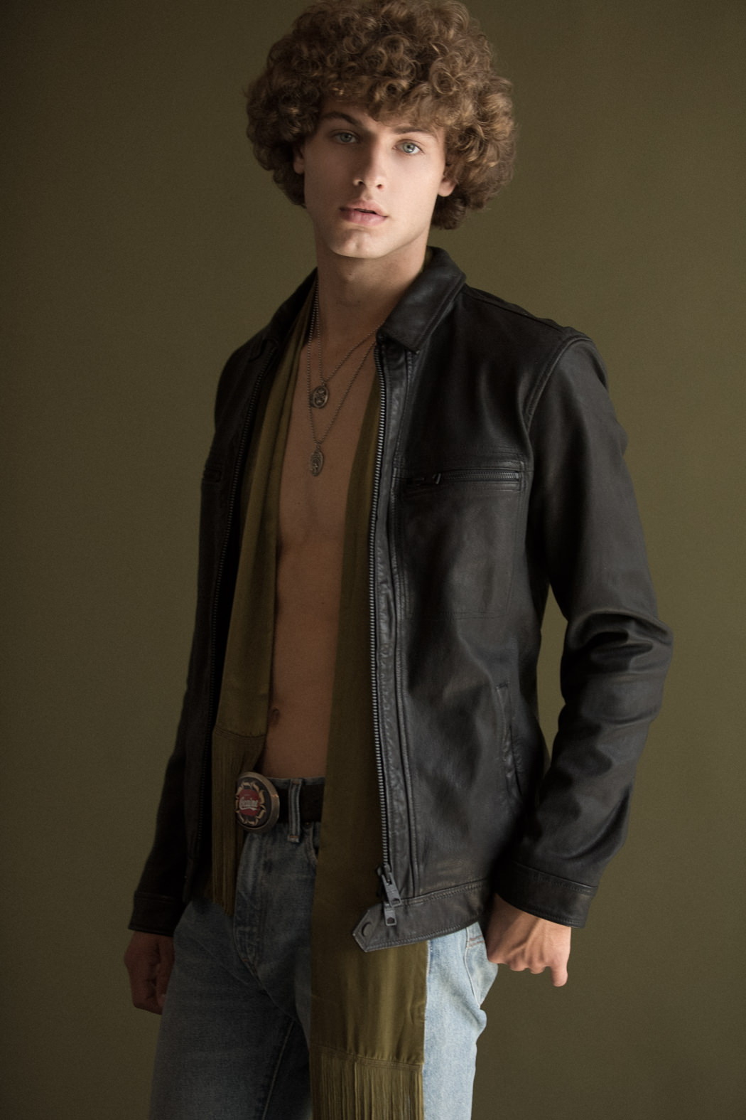 Jacket by All Saints Pants by Levi’s Scarf vintage Necklace by American Rag Glasses by American Rag Belt by American Rag