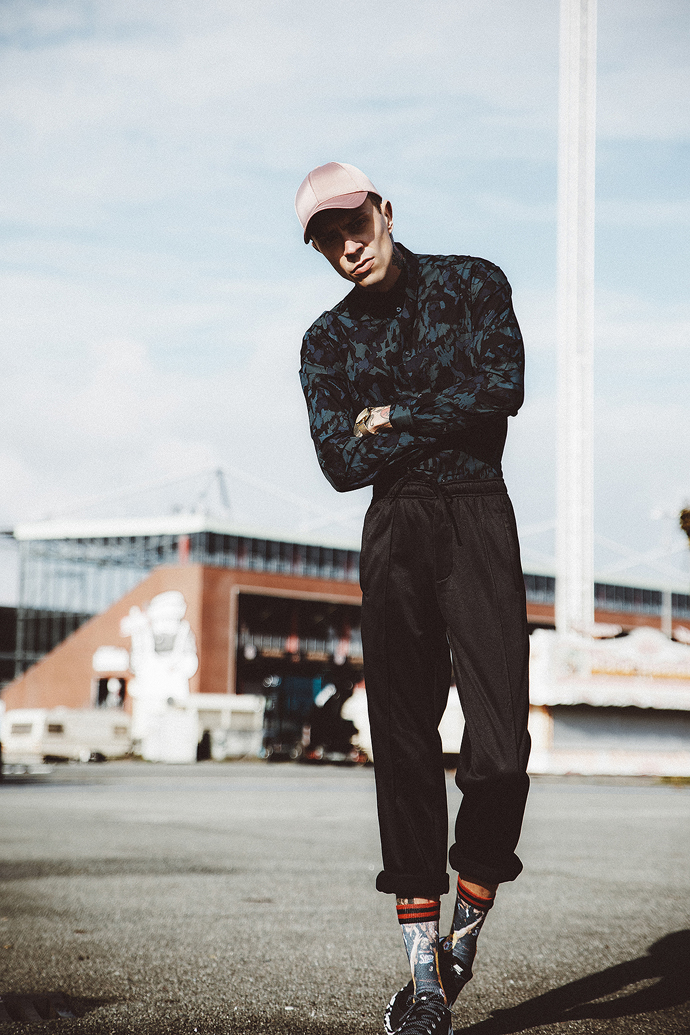 shirt by H&M,  pants by H&M,  cap by River Island,  sneaker by Nike , socks by Stans , watch by Komono,  bracelet by Paul Hewitt