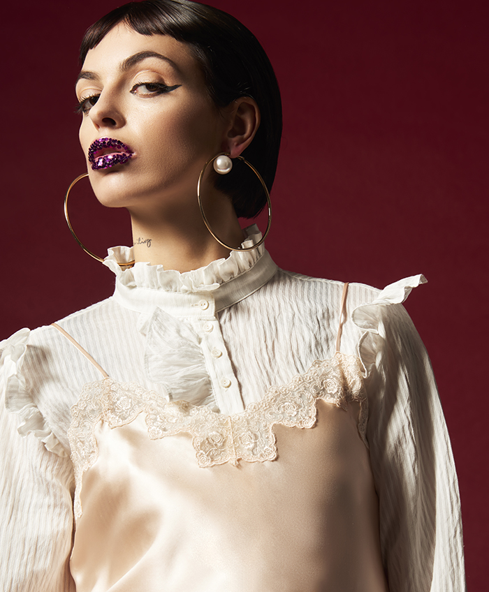 White shirt and Top: La Perla Earrings: H&M