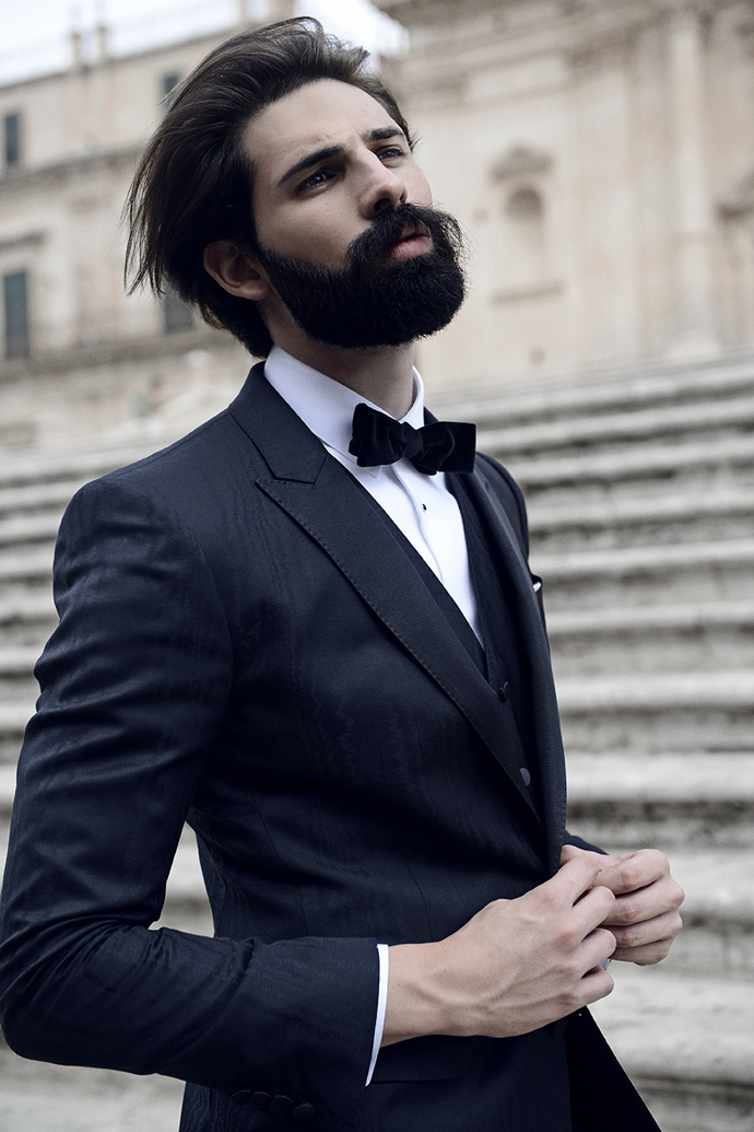 Suit, shirt & bowtie by Dolce e Gabbana