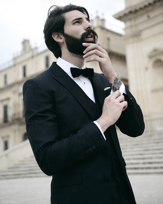 Suit, shirt & bowtie by Dolce e Gabbana