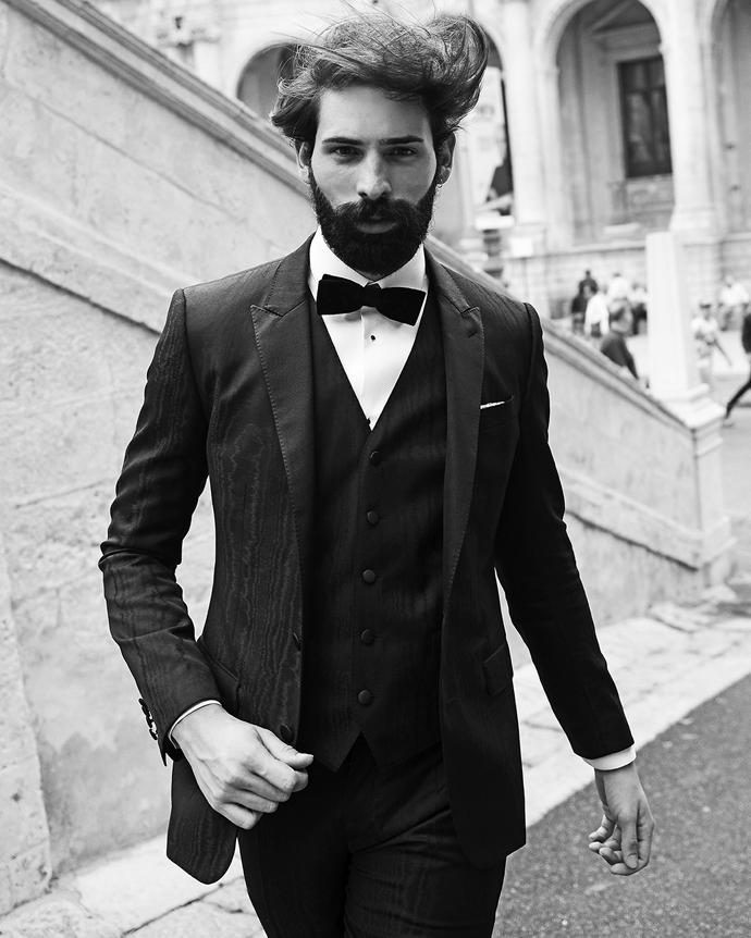 Suit, shirt & bowtie by Dolce e Gabbana