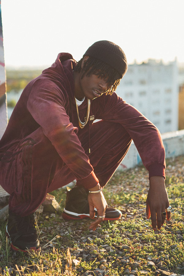 Sweatshirt and trousers by Adidas Beanie by Gap Necklaces by H&M Sneakers by Nike 