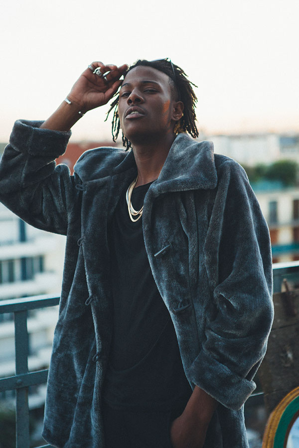 Faux-fur coat by Gabriella Vincenza Tshirt and necklaces by H&M Trousers by Zara Glasses by Ray-Ban