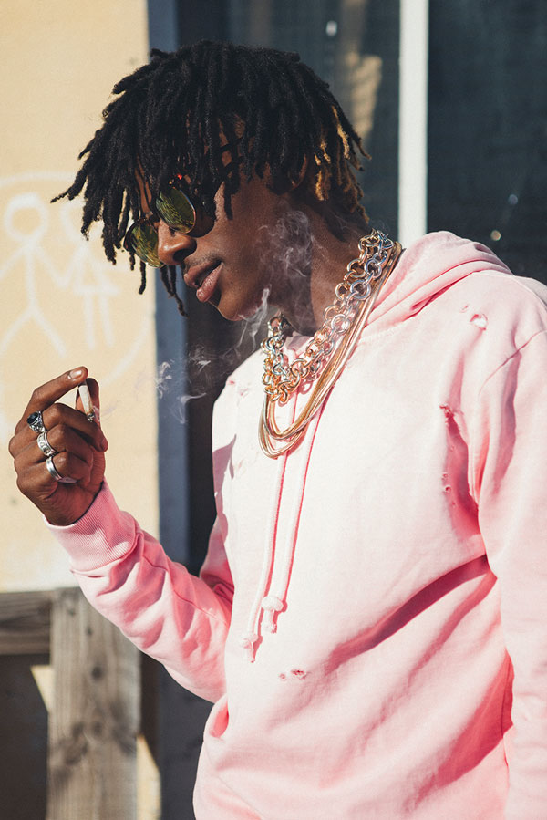 Sweatshirt, necklaces and glasses by H&M