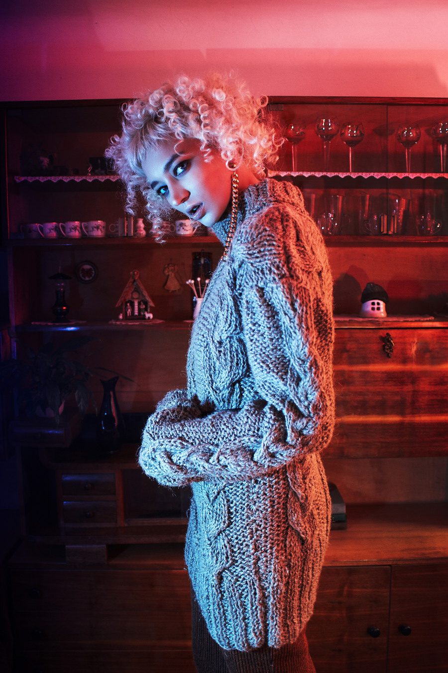 Sweater: Patryk Wojciechowski Skirt: TUNDRA Belt: Kazar Earrings: Gkiokan Karad Heels: Kazar