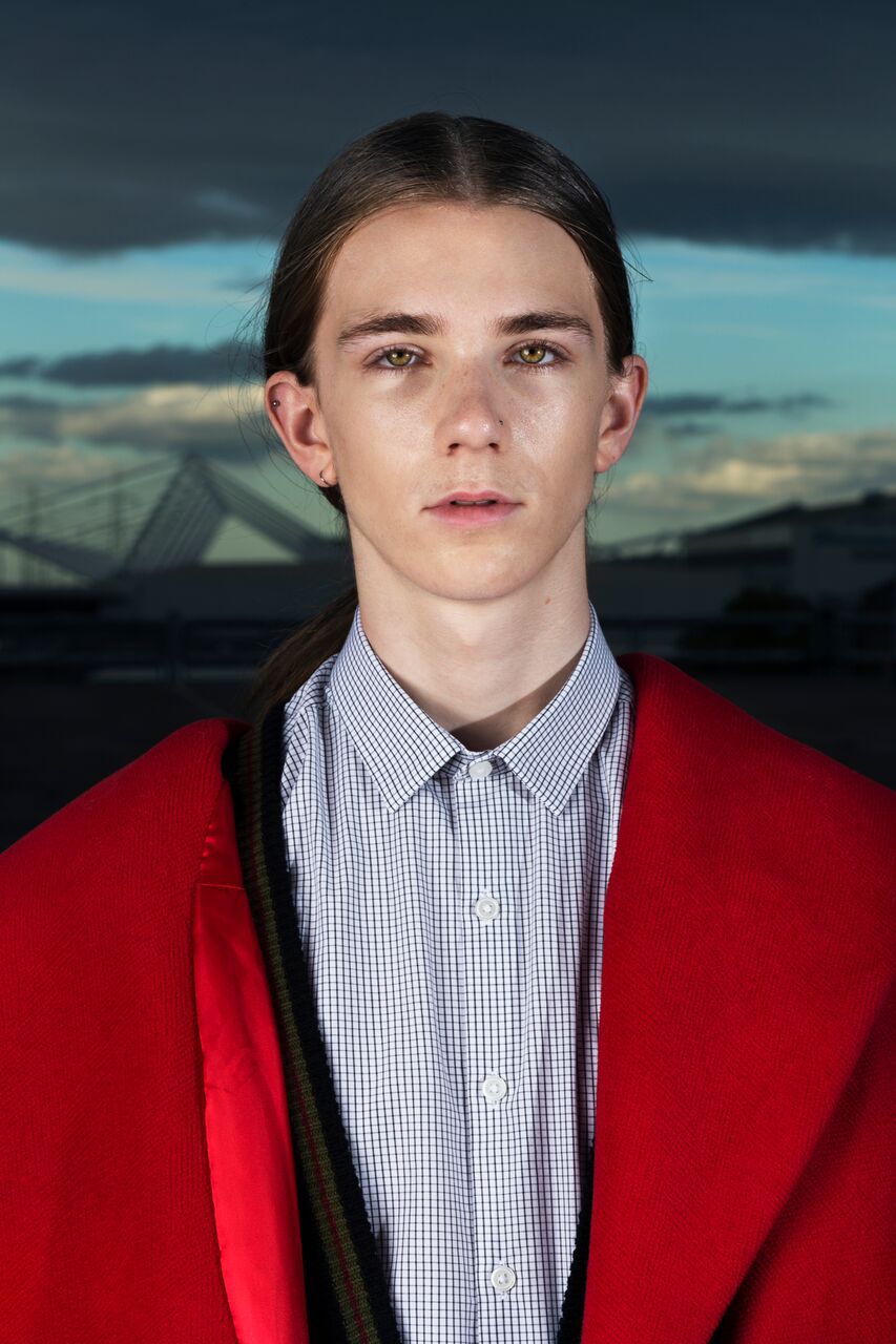 Boru wears Grant-James Povey coat, Topman jeans, Doc Martin Boots 