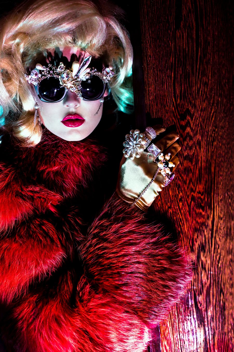 Fur: Eggert Feldskeri Diamond crusted glasses: Jón Albert Rings: Jón Albert, Valentino, Dior. 