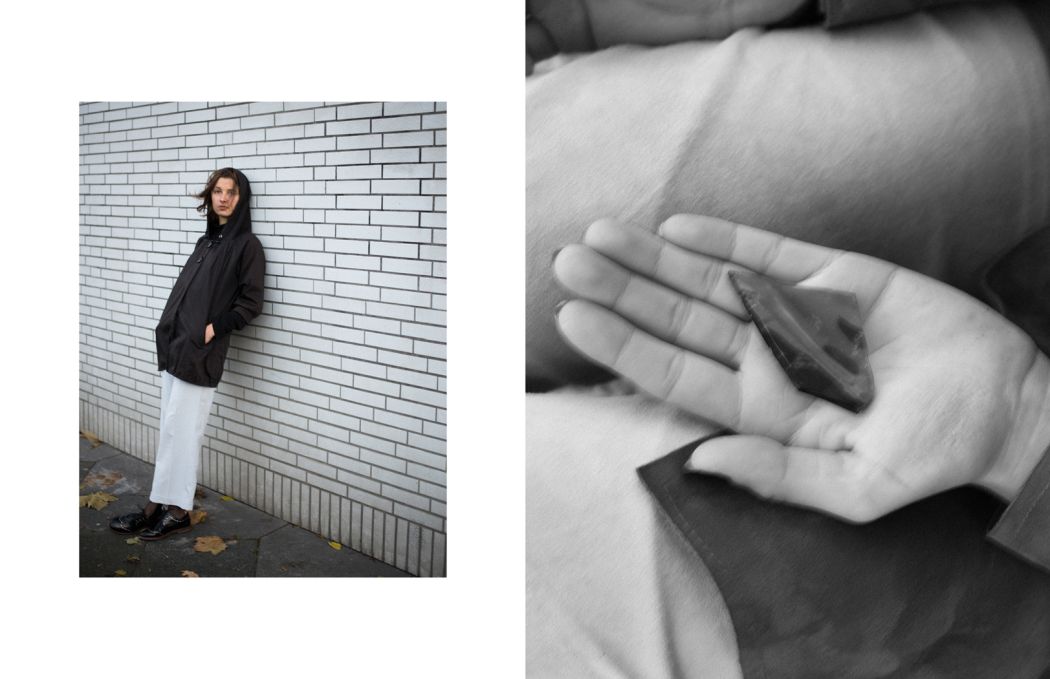 left side: Coat by Lux Pants by Acne Studios Shoes by Hudson right side: hand with glass 